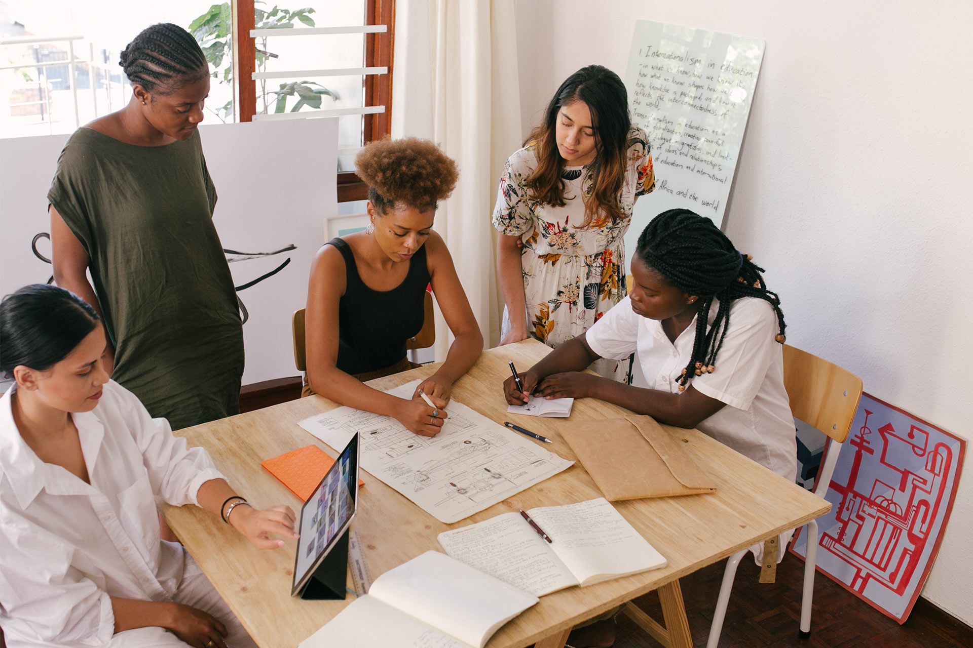 A team meeting where a problem is being solved with the PDCA management method.