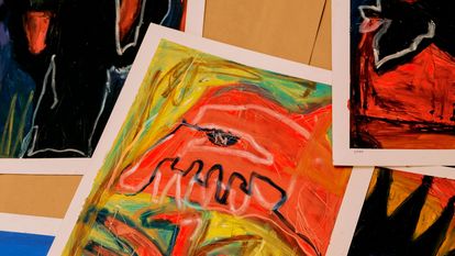 Two pictures of abstract art overlaying each other