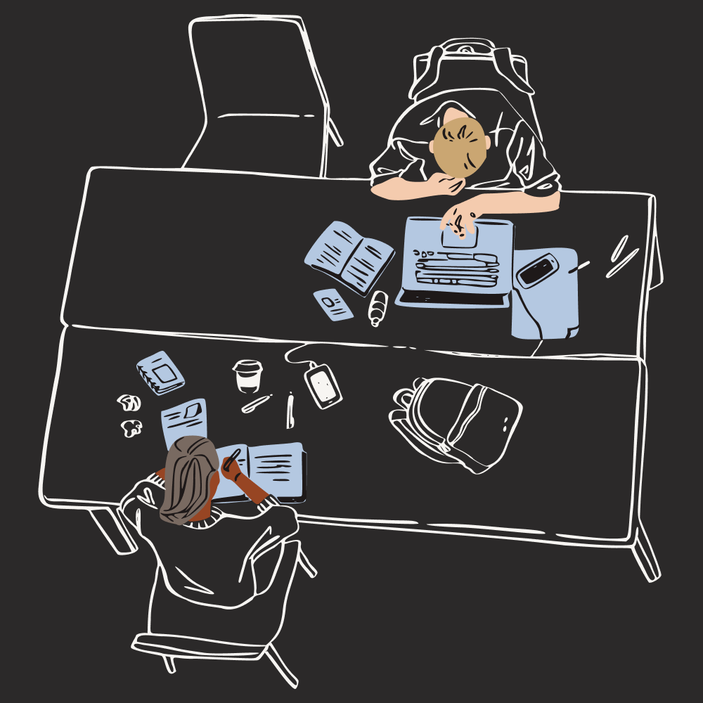 Personen, die an einem Schreibtisch arbeiten.
