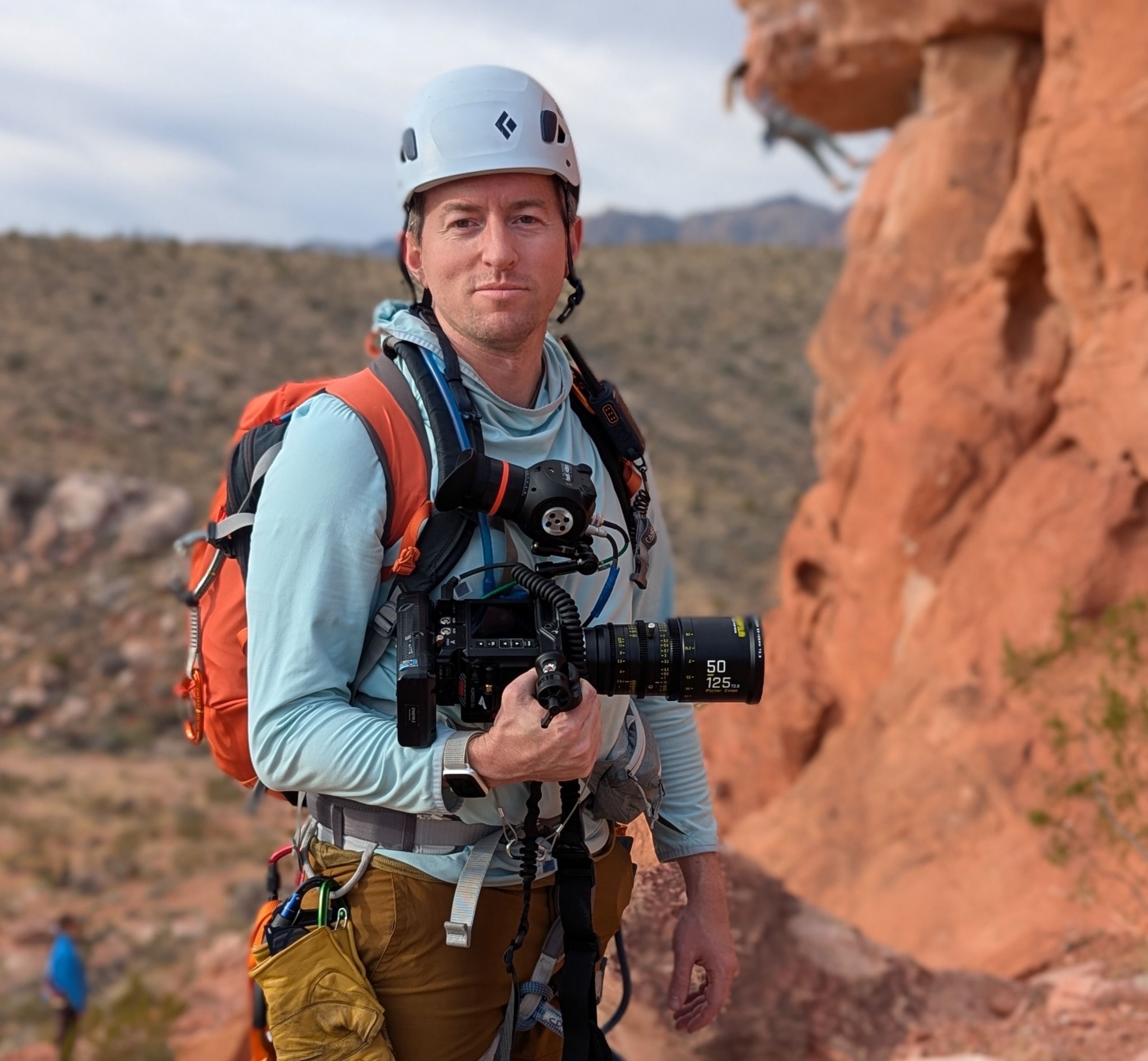 Philip Goodwin with a camera on a mountain