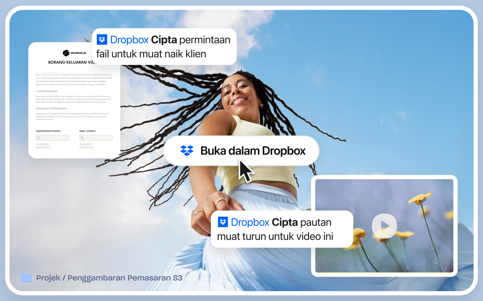 Seseorang duduk di meja yang dikelilingi oleh kertas dan fabrik berwarna-warni