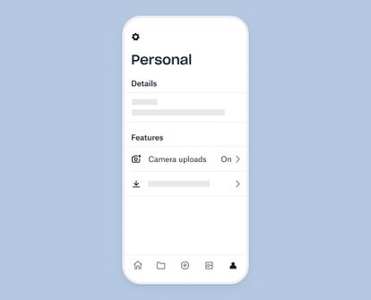 A user turning on the camera uploads feature in the Dropbox mobile app