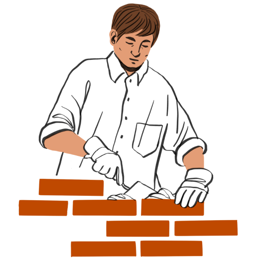 A person carefully lays a brick wall.