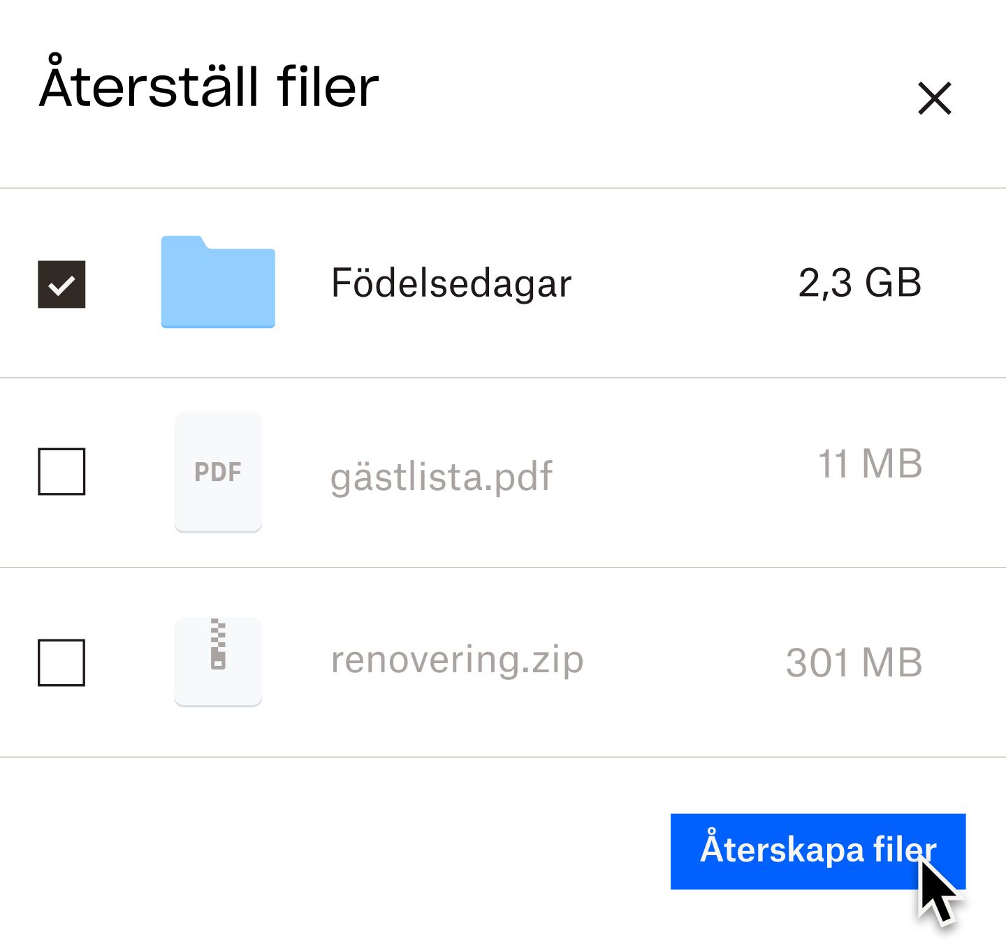 En användare som klickar på en blå knapp märkt ”återställ filer”