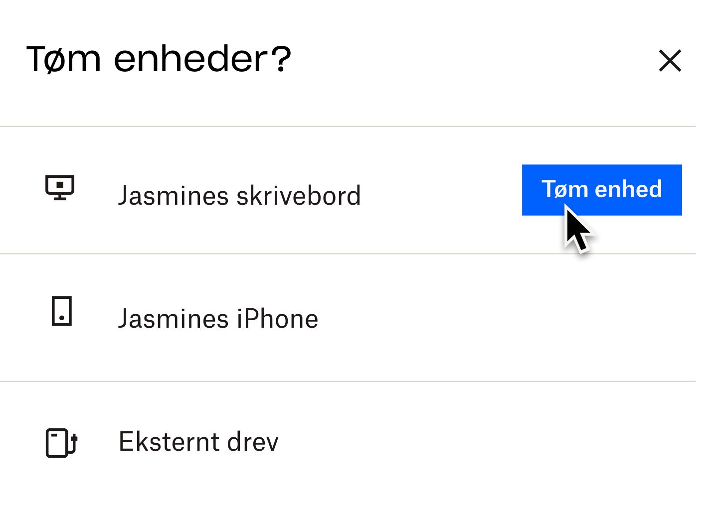 En bruger, der klikker på en blå knap mærket &quot;rens enhed&quot;