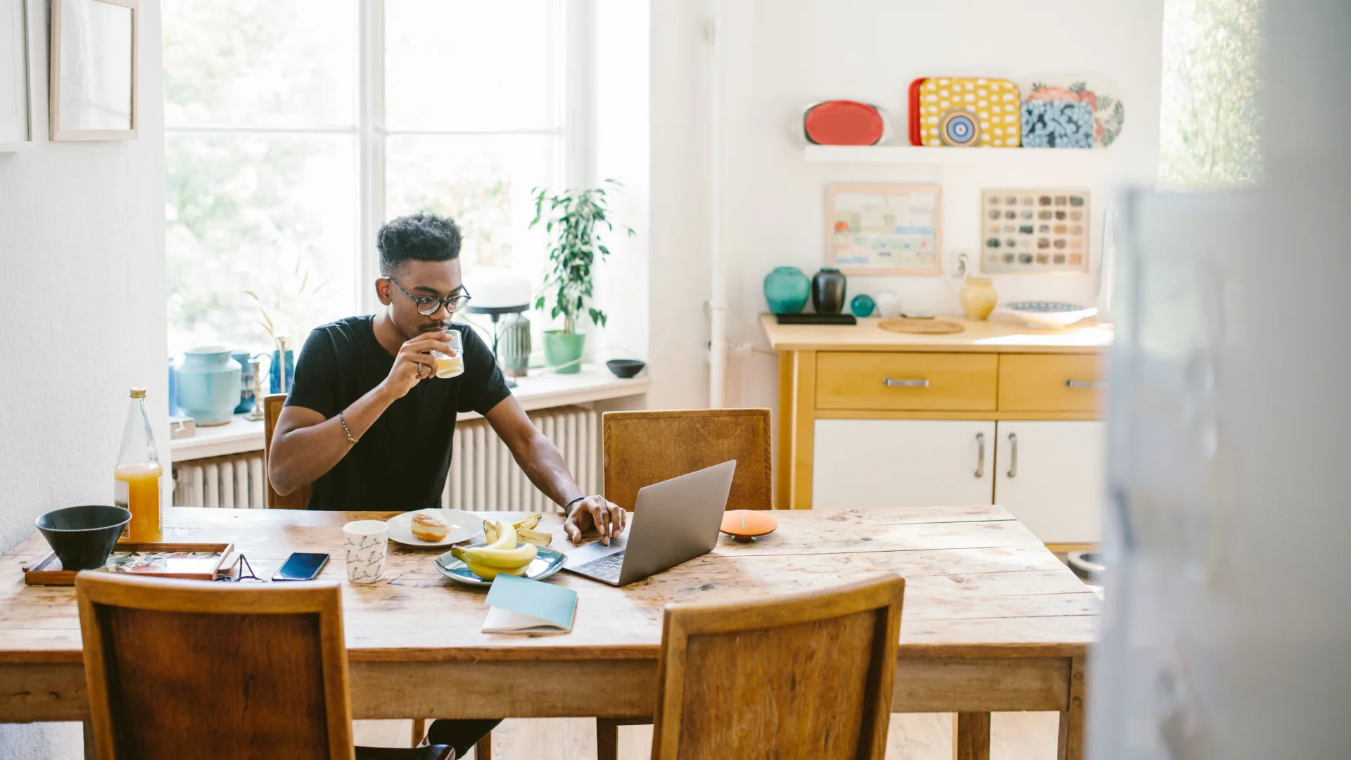 Freelancer working on the kitchen table