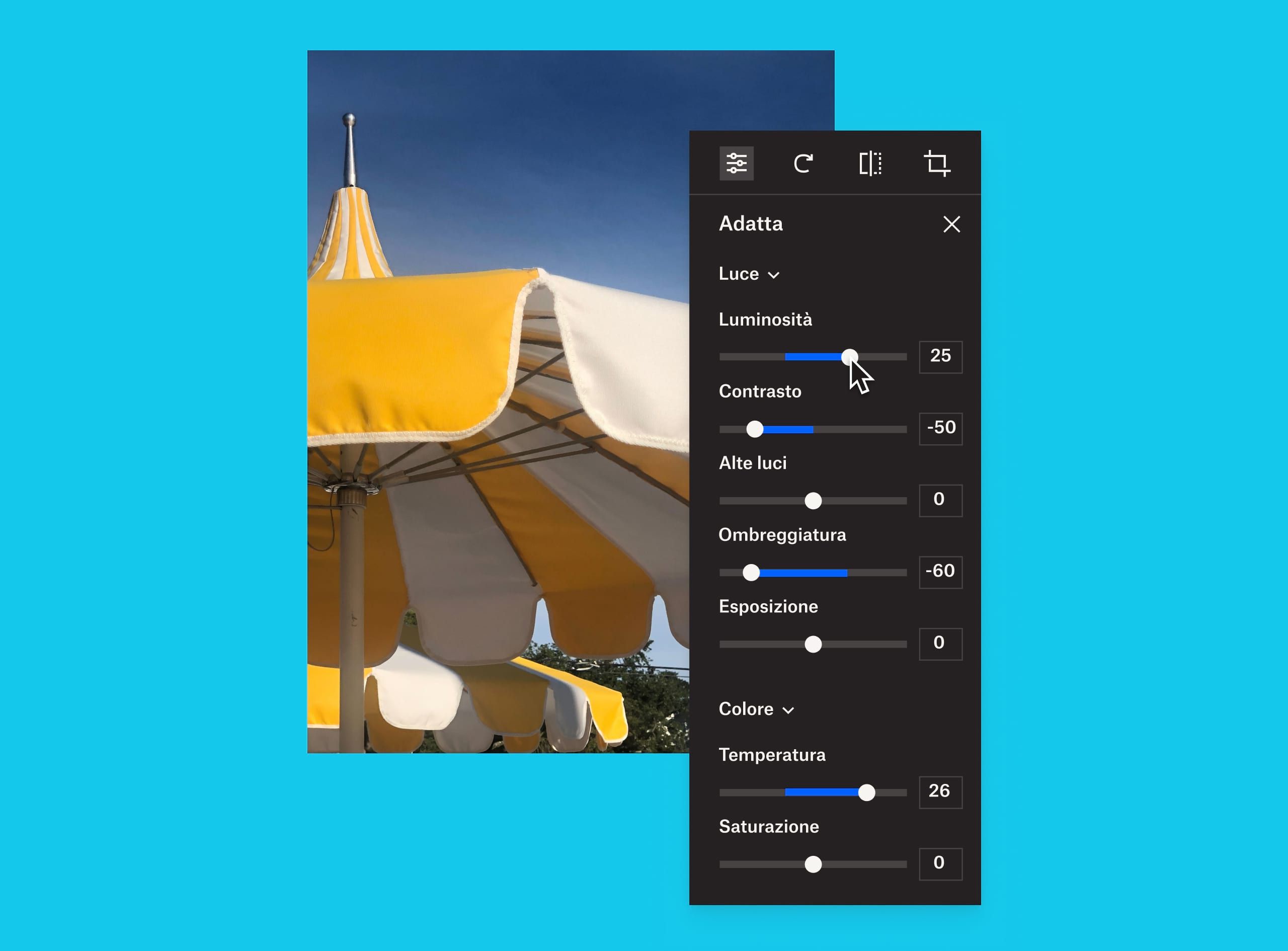 Immagine di un ombrello giallo e bianco a cui si sovrappone un pannello di regolazione dell'immagine da cui un utente sta modificando la luminosità