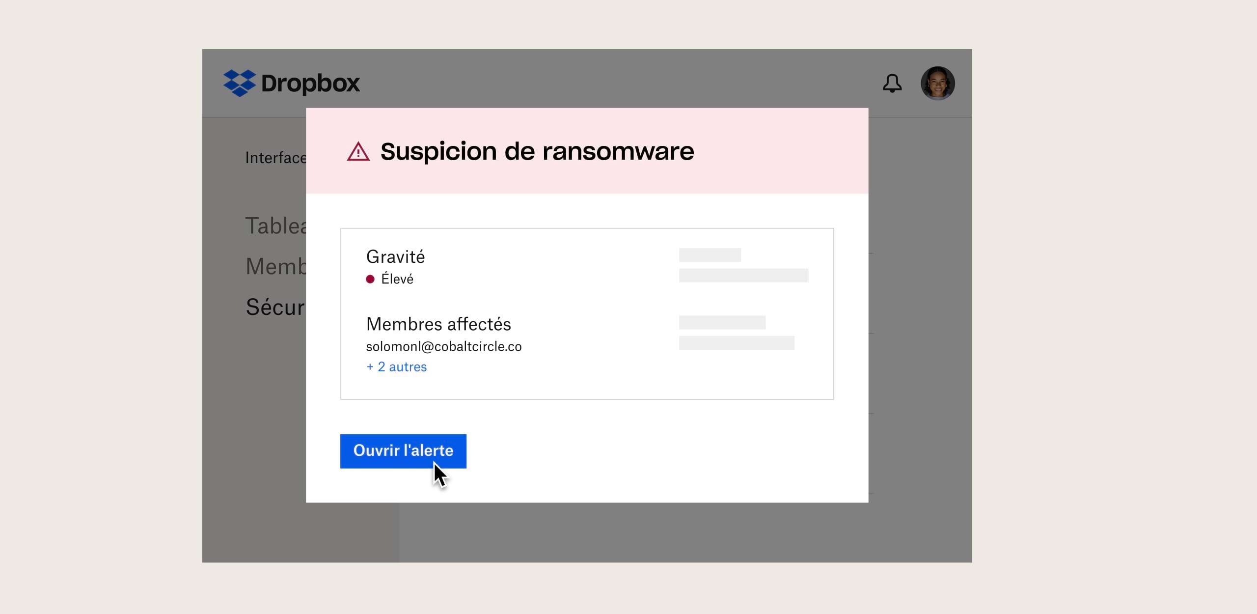 Utilisateur consultant un message de sécurité Dropbox qui signale une suspicion de ransomware