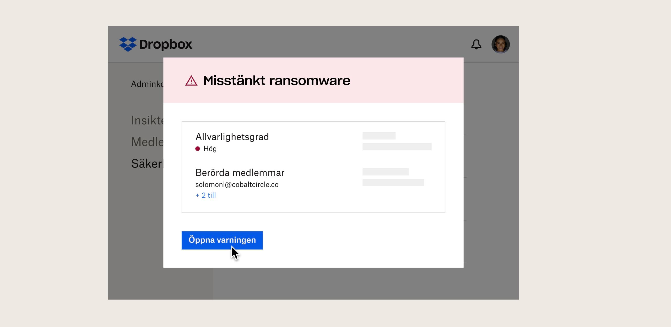 En användare som visar en misstänkt säkerhetsprompt för ransomware i Dropbox