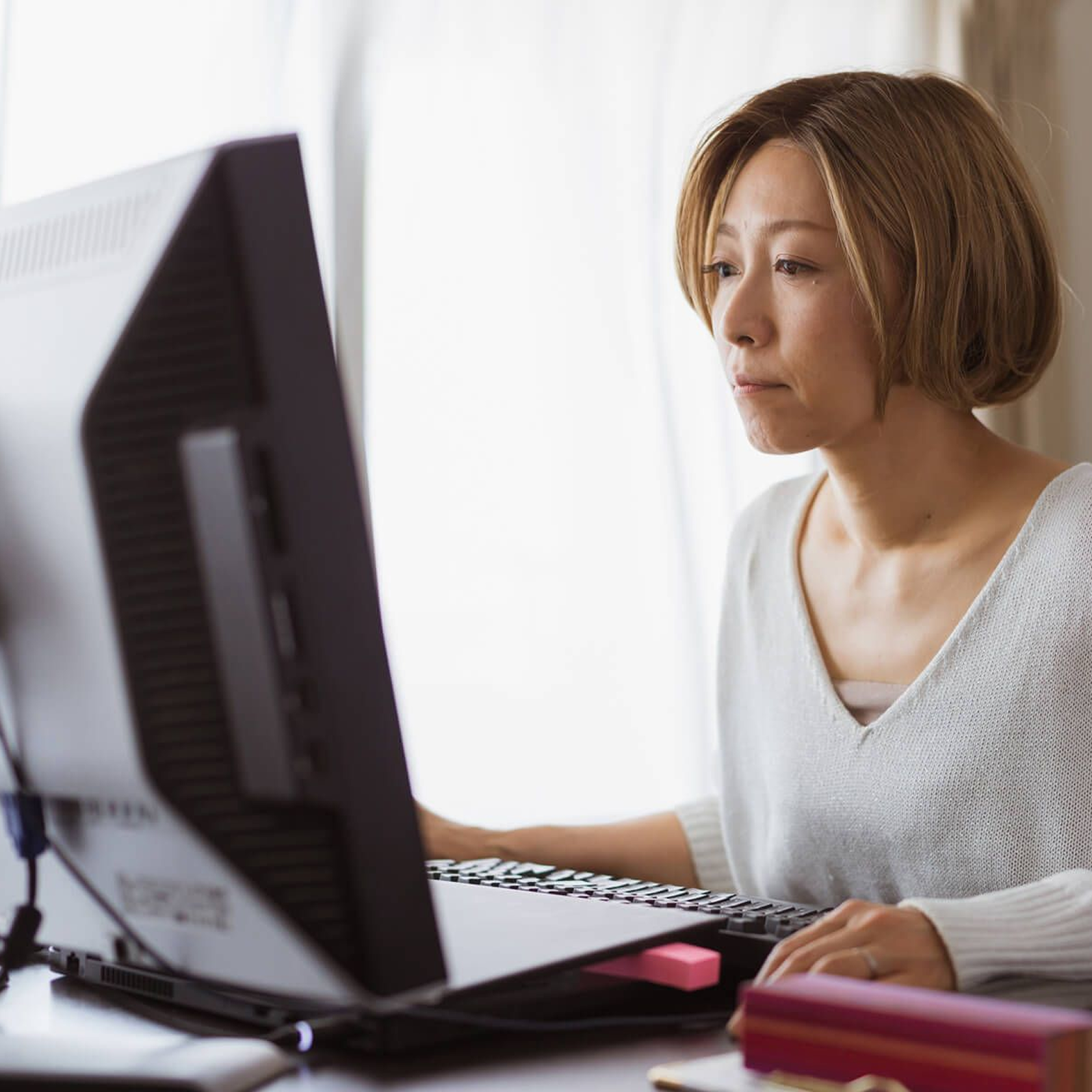 A remote worker adds password protection to a document before sharing with colleagues.