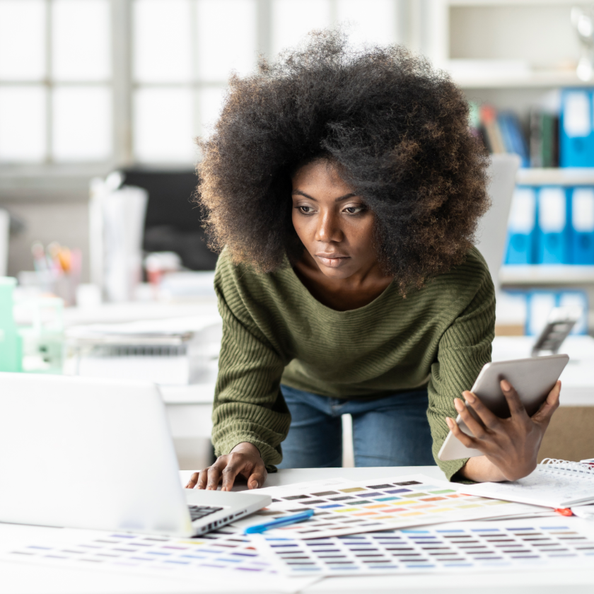A person planning how to protect their files from a cyber attack by backing them up online.