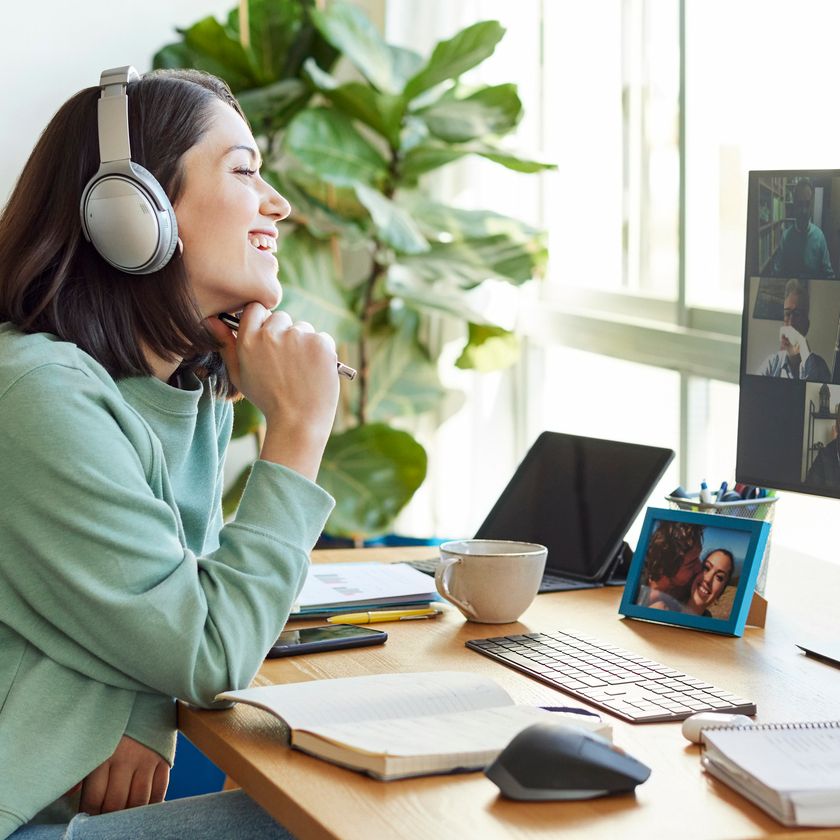 A remote worker attends a video call meeting