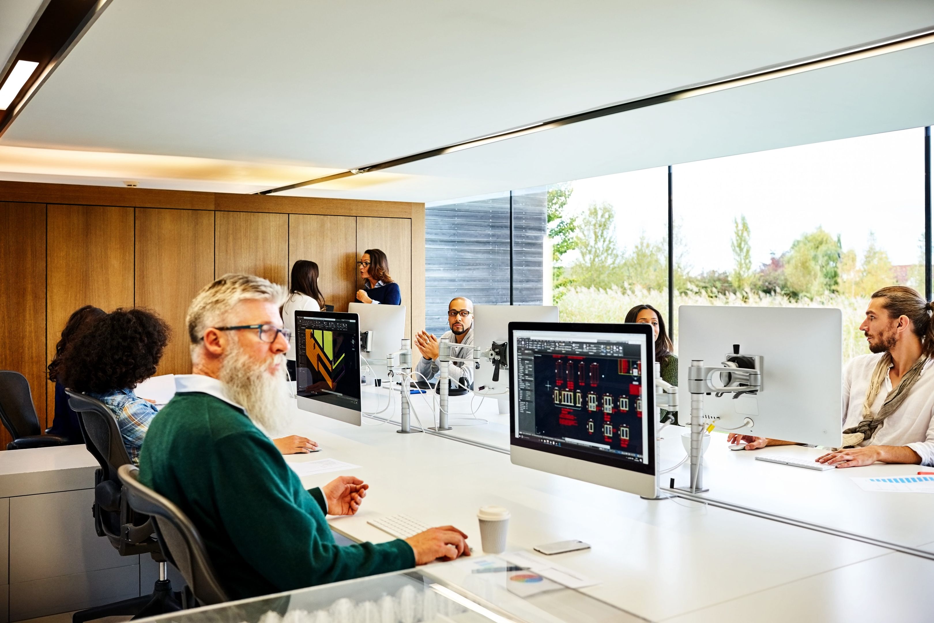 A team works securely across cloud storage in an office environment.