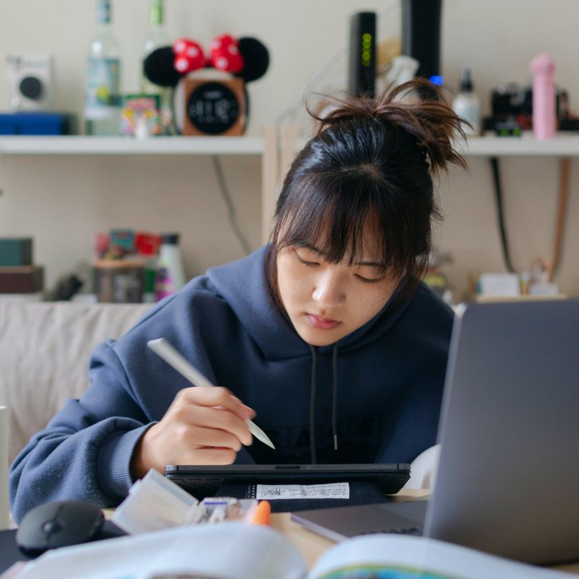 A designer working on their tablet.