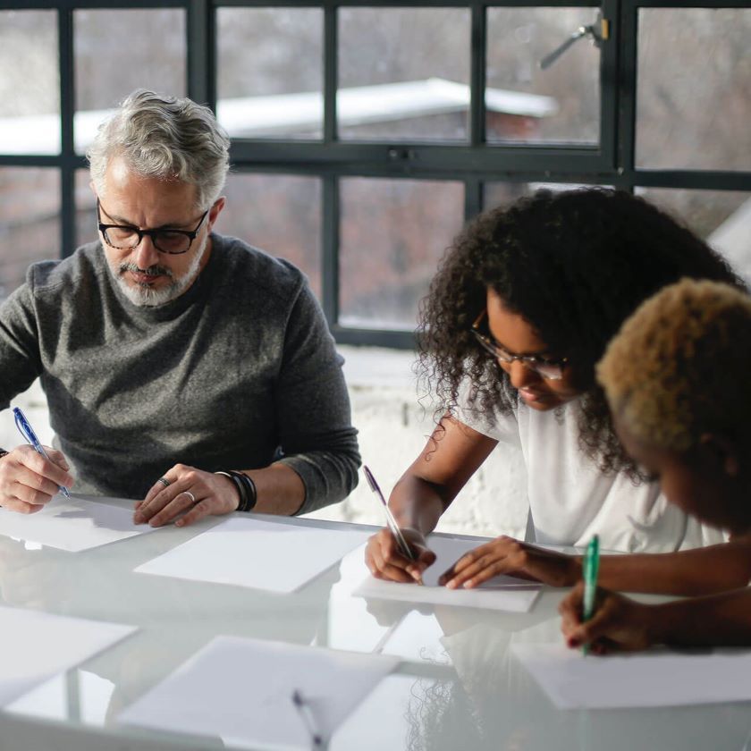 A team working together on a project plan.
