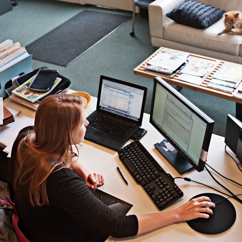 Woman using Dropbox to easily manage her documents electronically
